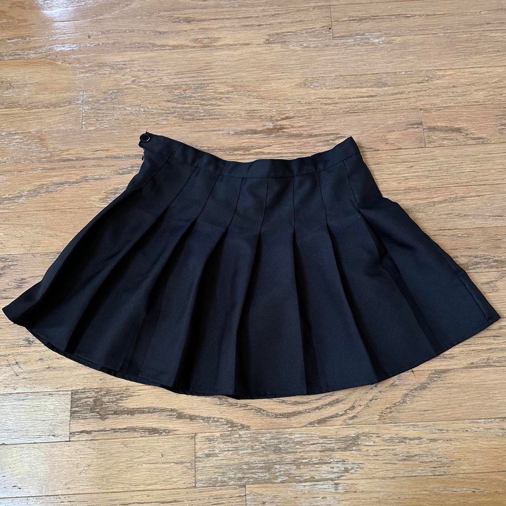 black pleated mini skirt